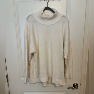 Cozy Cream Turtleneck Sweater from Free People.